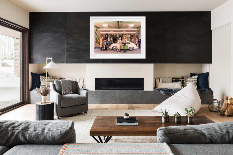 Arrival at the Little Nell Hotel in Porsche 356. Aspen