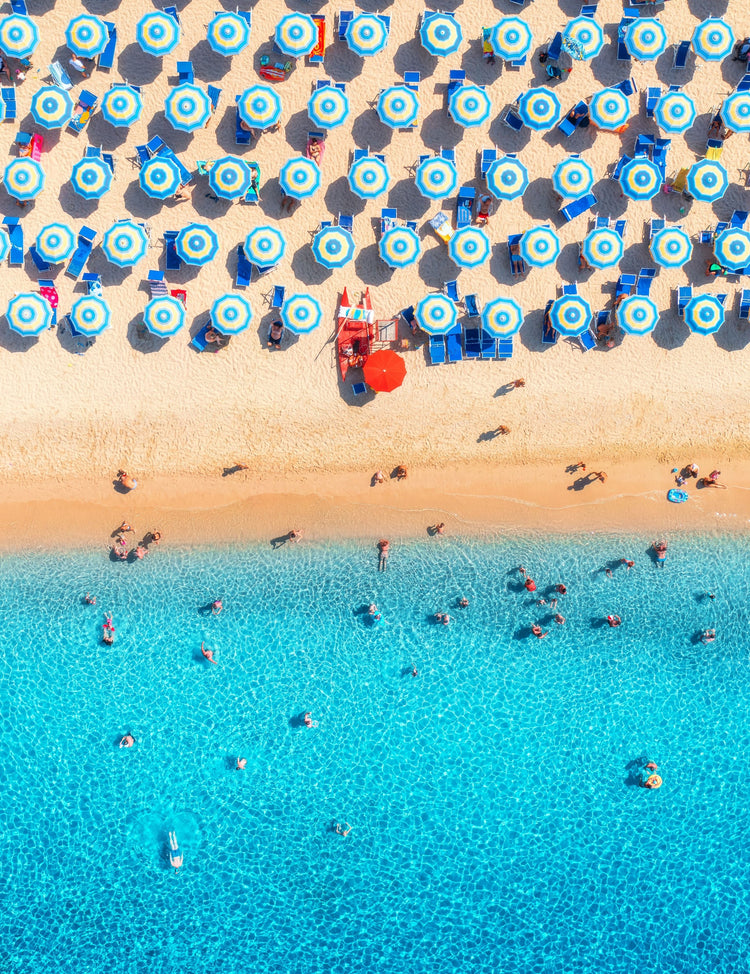 Blue and White Umbrellas. Sardinia, Italy (Portrait)