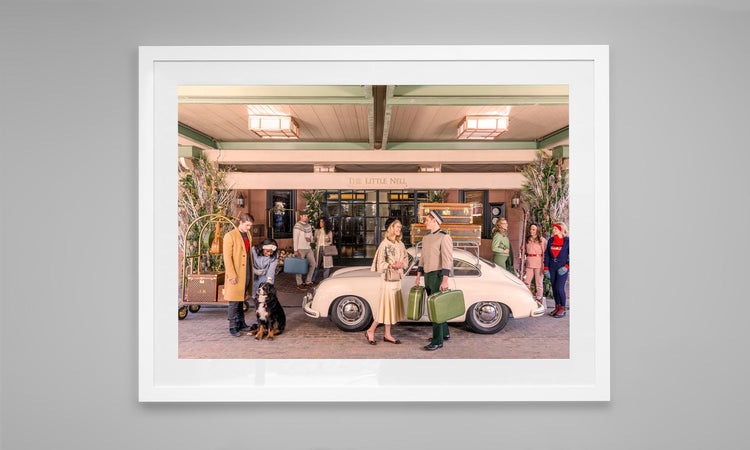 Arrival at the Little Nell Hotel in Porsche 356. Aspen