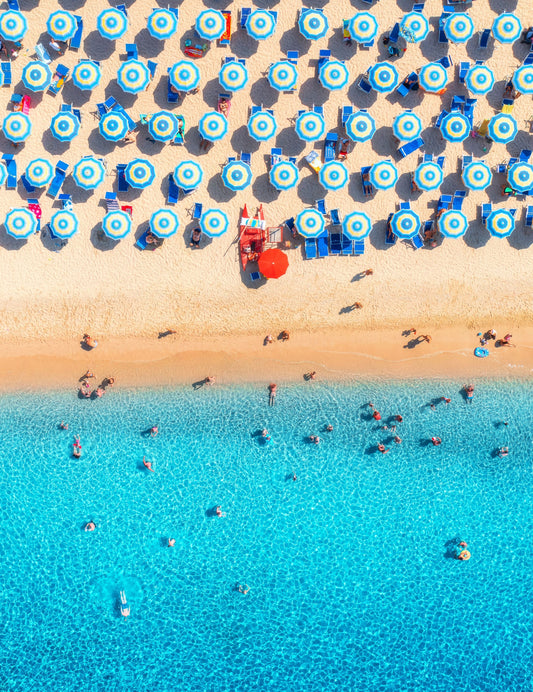 Blue and White Umbrellas. Sardinia, Italy (Portrait)