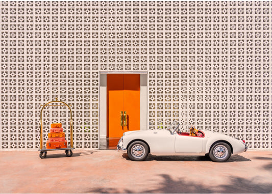 Arrival at the Parker, Palm Springs in a 1960 MG Roadster