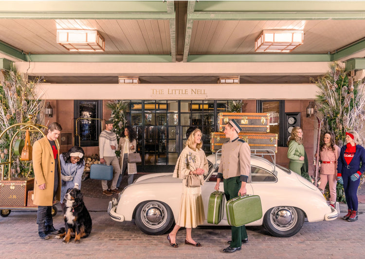 Arrival at the Little Nell Hotel in Porsche 356. Aspen